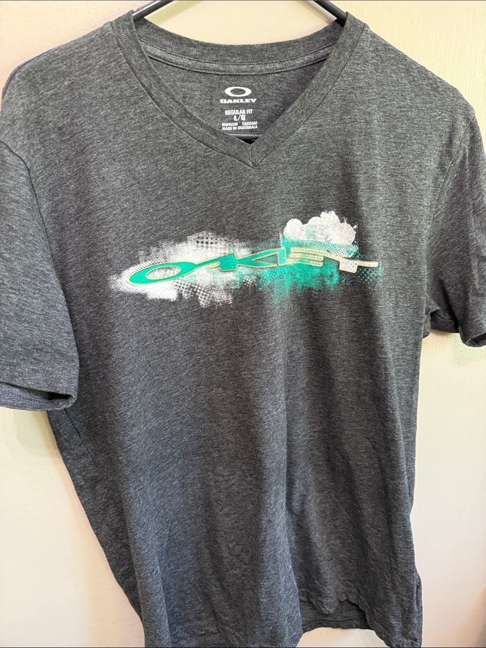 Oakley Charcoal V-Neck Tee with Teal and White Logo